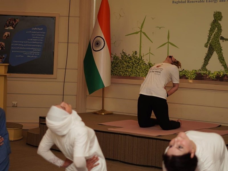 Yoga for Inner Harmony, Sustainability for a Better Planet. As part of the lead-up to the 12th International Day of Yoga 2026, the Embassy of India in Baghdad organized a promotional event on 3 June 2026 at the Renewable Energy and Sustainability Center, Baghdad. The yoga session was led by Embassy instructor Ms. Noor Younis. The event brought together two powerful pathways toward a common goal—a better world. While yoga nurtures inner well-being, renewable energy and sustainable practices help protect our planet for future generations. Ambassador Soumen Bagchi and Mr. Mohammad Shakir Al-Dulaimi, CEO of the Center, joined participants after the yoga session. As a global pioneer in solar and renewable energy, Ambassador conveyed India’s willingness to collaborate with the Center in advancing its sustainability goals. Inspired by this year's theme, “Yoga for Wellness, Wisdom and World Peace,” the event highlighted a simple yet powerful message: a sustainable future begins with balanced minds, responsible actions, and collective commitment. Join us for the grand celebration of International Day of Yoga 2026 on 20 June 2026 in Baghdad.