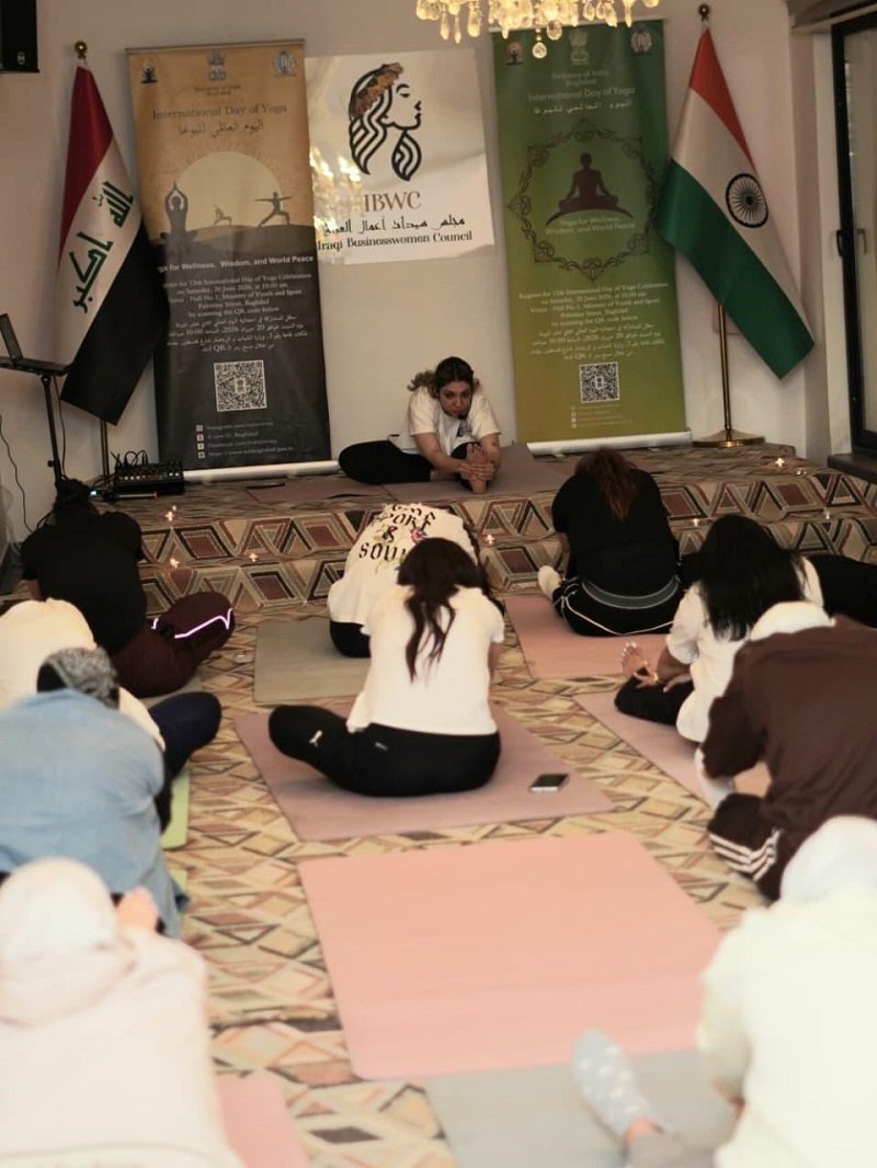Empowering Leadership through Yoga. As part of the lead-up to the 12th International Day of Yoga 2026, the Embassy of India in Baghdad held a special yoga session for a group of women entrepreneurs and business leaders at the offices of the Iraqi Business Women Council in Baghdad. The session was led by Embassy-trained instructor Ms. Noor Younis. The gathering celebrated the shared belief that success is most meaningful when accompanied by balance and well-being. The participants expressed their appreciation to the Embassy for the initiative and reaffirmed their commitment to joining the grand celebration of the International Day of Yoga 2026 in Baghdad on 20 June 2026. Ambassador Soumen Bagchi thanked the Council for its active partnership in promoting yoga among 25 members. He invited Dr. Maha Al-Obaidi, Founding Member of the Council, to explore ways to strengthen business ties between the two countries, in collaboration with the Embassy. The event reflected a simple yet powerful idea: when empowered women invest in their own well-being, they strengthen not only themselves, but also the businesses, families, and communities they lead.