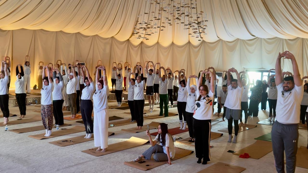 Bringing yoga closer to the community! While the celebrations of the 12th International Day of Yoga may have concluded, the spirit of yoga continues to inspire people across Iraq. Let's look back at the joyful celebrations of the 12th International Day of Yoga and revisit one of the most engaging sessions organised by the Embassy of India in collaboration with Wolf Gym. The session was led by Dr. Dheeraj Prakash Joshi, Yoga Guru. The session, organised on 18 June 2026 three days ahead of the International Day of Yoga 2026, witnessed remarkable participation from a cross section of people, reflecting the growing enthusiasm for yoga. Ambassador Soumen Bagchi also participated in the session along with Officers of the Indian Embassy.The session aimed to spread awareness about the benefits of yoga, encouraging families and local residents to embrace a healthier, more balanced lifestyle through this timeless practice. What are you waiting for, then. Join the Yoga classes at the Embassy of India, Baghdad