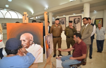 Portraits of Mahatma Gandhi being sketched by Iraqi Painters at the Iraqi Fine Artist Association in Baghdad on July 23, 2019